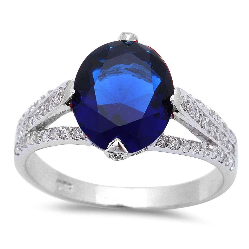 <span>CLOSEOUT!</span>.925 Sterling Silver 4ct Oval Cut Blue Sapphire & Cz Fashion Ring